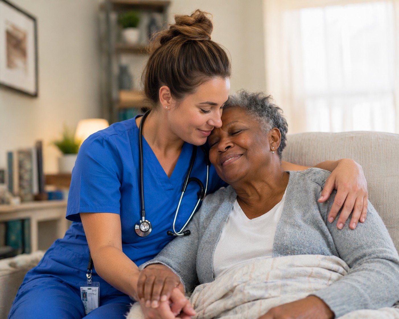 Compassionate Core Health Group caregiver comforting an elderly patient